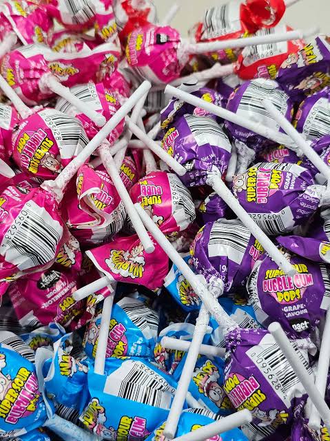 Warheads super sour bubblegum pops 🍭 (Melt alert ⚠️)